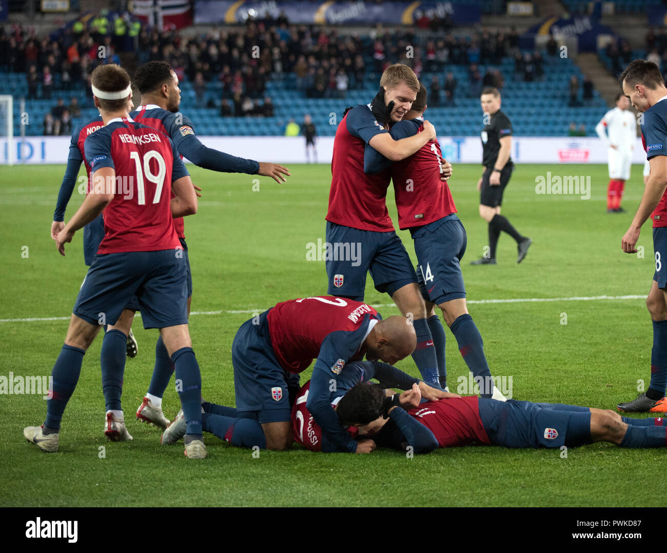 Oslo, Norway. 16th Oct, 2018. Mohamed Elyounoussi (11) of Norway scores for 1-0 and is surrounded by team mates during the UEFA Nations League football match between Norway and Bulgaria at Ullevaal Stadion. (Photo credit: Gonzales Photo - Jan-Erik Eriksen). Credit: Gonzales Photo/Alamy Live News Stock Photo