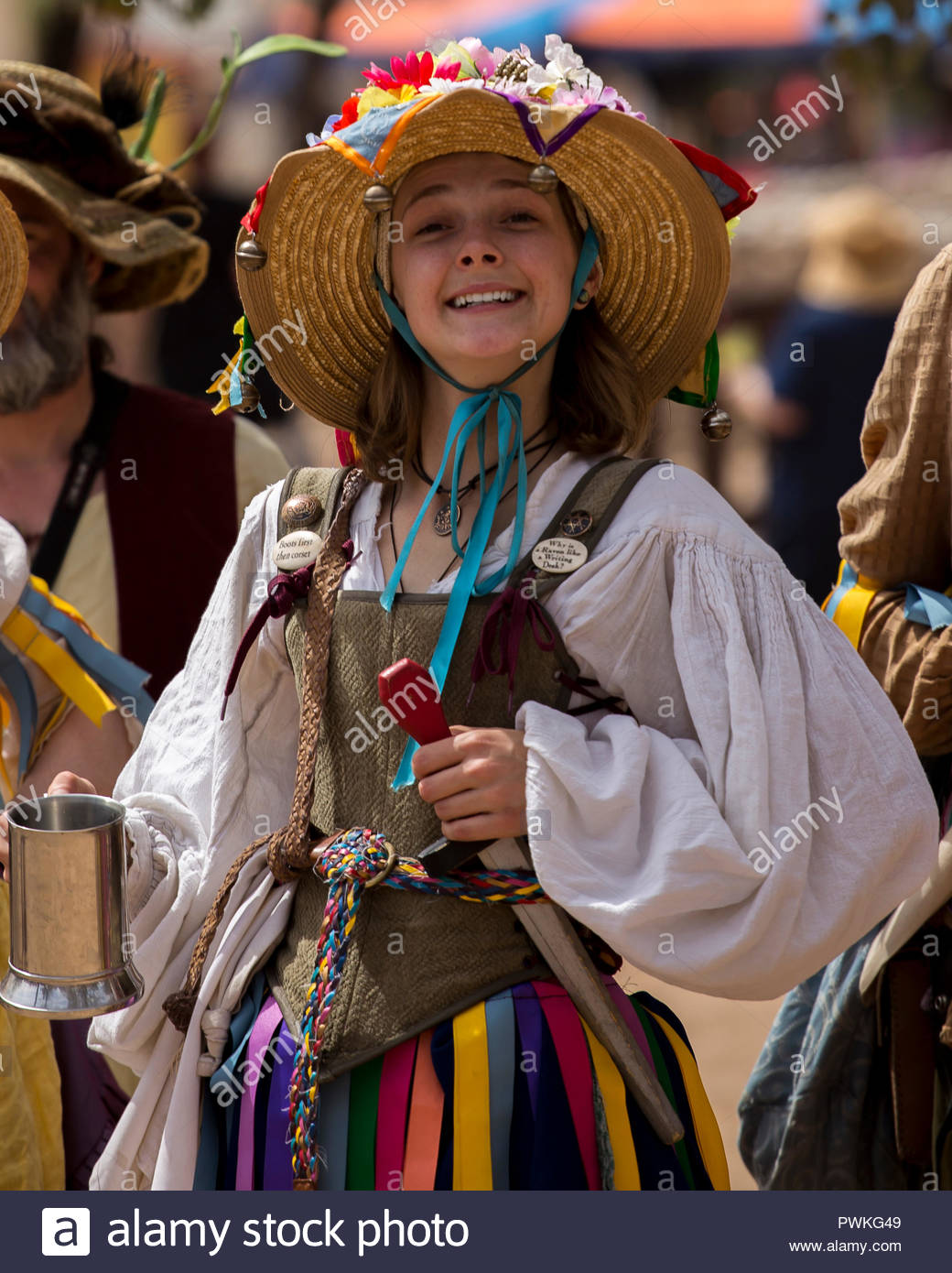 One of many women dressed in period costume at the