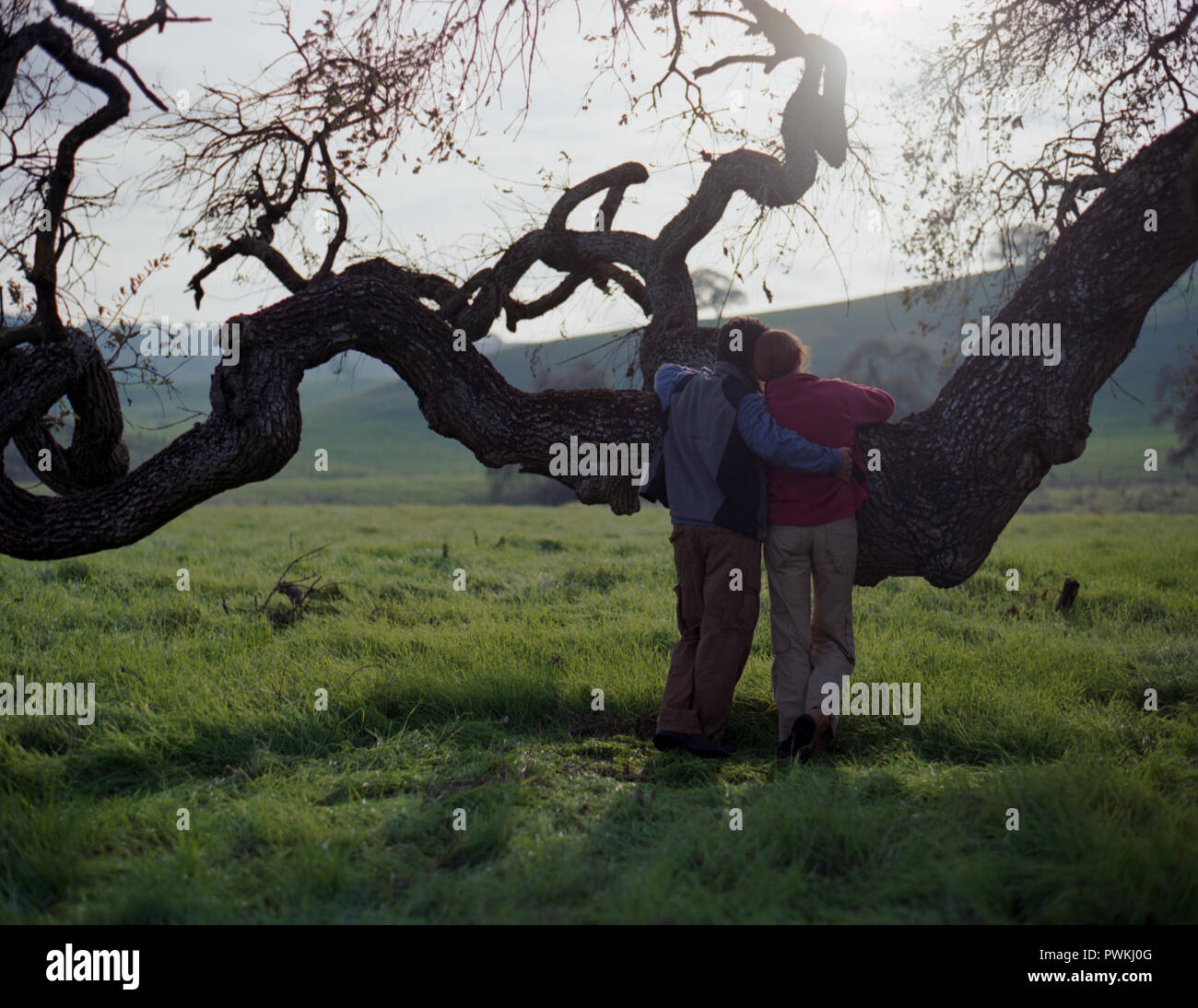 Two boys arms around each other hi-res stock photography and images - Alamy