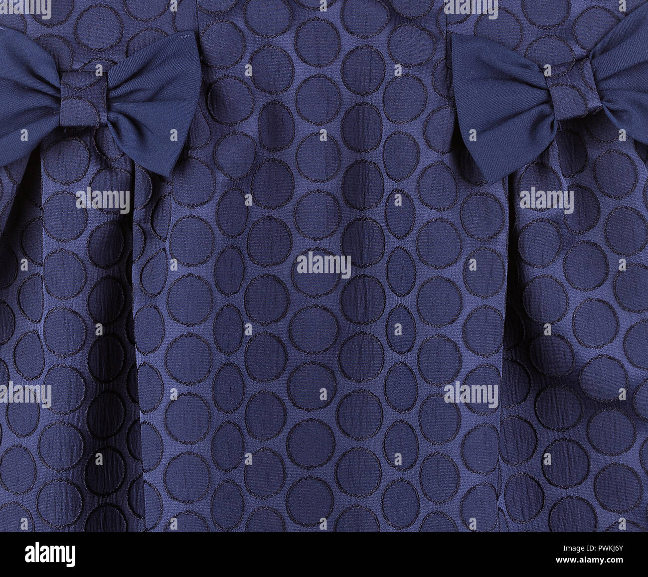 Part of blue dress with polka dot background with fold Stock Photo