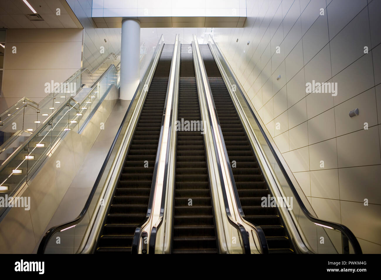 Three escalators. Stock Photo