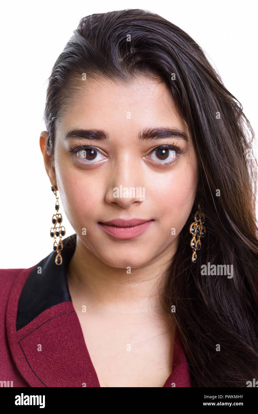 Portrait of young beautiful Indian businesswoman face Stock Photo