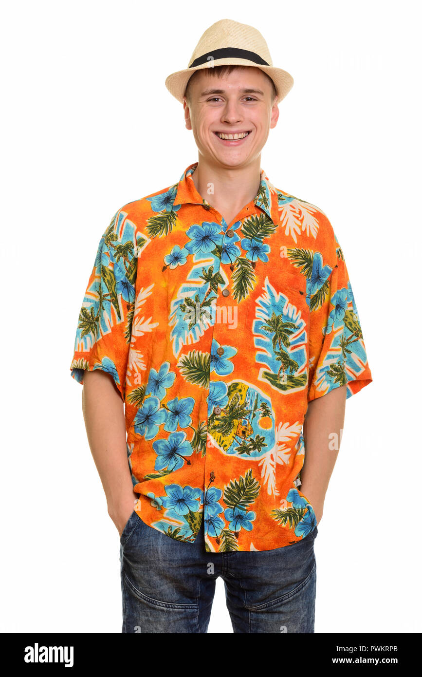 Young happy Caucasian tourist man smiling and wearing hawaiian shirt ...