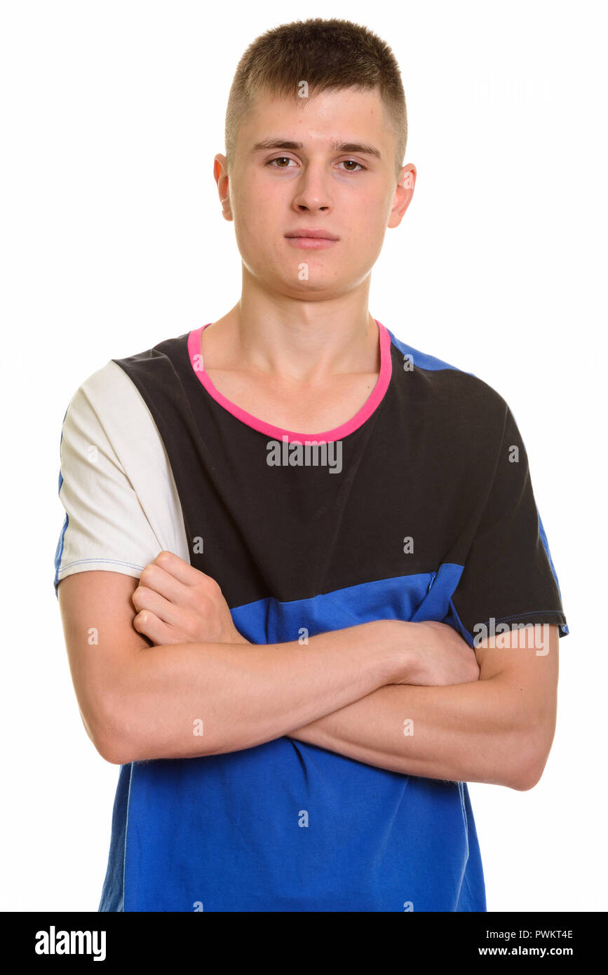 Young confident Caucasian man with arms crossed Stock Photo