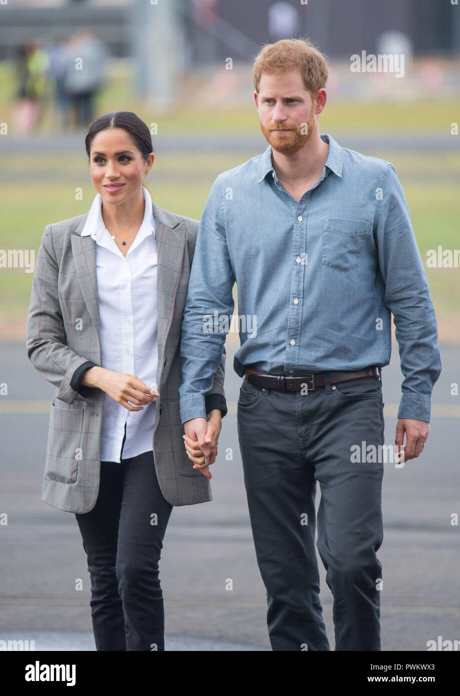 The Duke and Duchess of Sussex attend the naming and unveiling of a new Royal Flying Doctor Service aircraft at Dubbo City Regional Airport, in Dubbo, New South Wales, on the second day of the royal couple's visit to Australia. Stock Photo