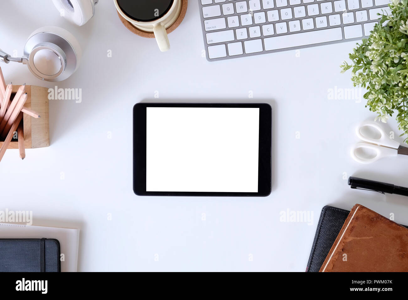 Download Top View Workspace With Mockup Tablet On White Table And Office Supplies Stock Photo Alamy PSD Mockup Templates