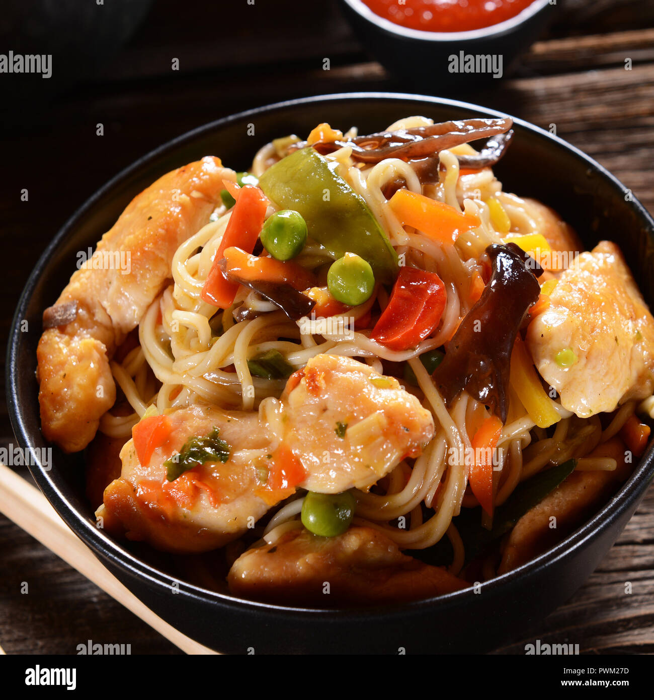 Chicken with Rice Noodles and Vegetables Stock Photo - Alamy