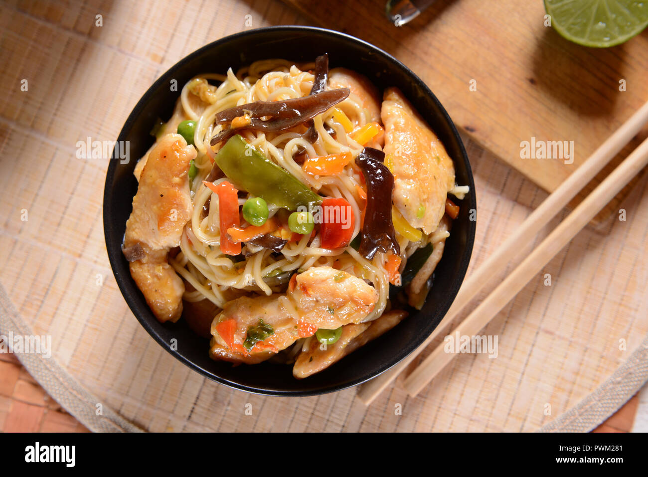 Chicken with Rice Noodles and Vegetables Stock Photo - Alamy