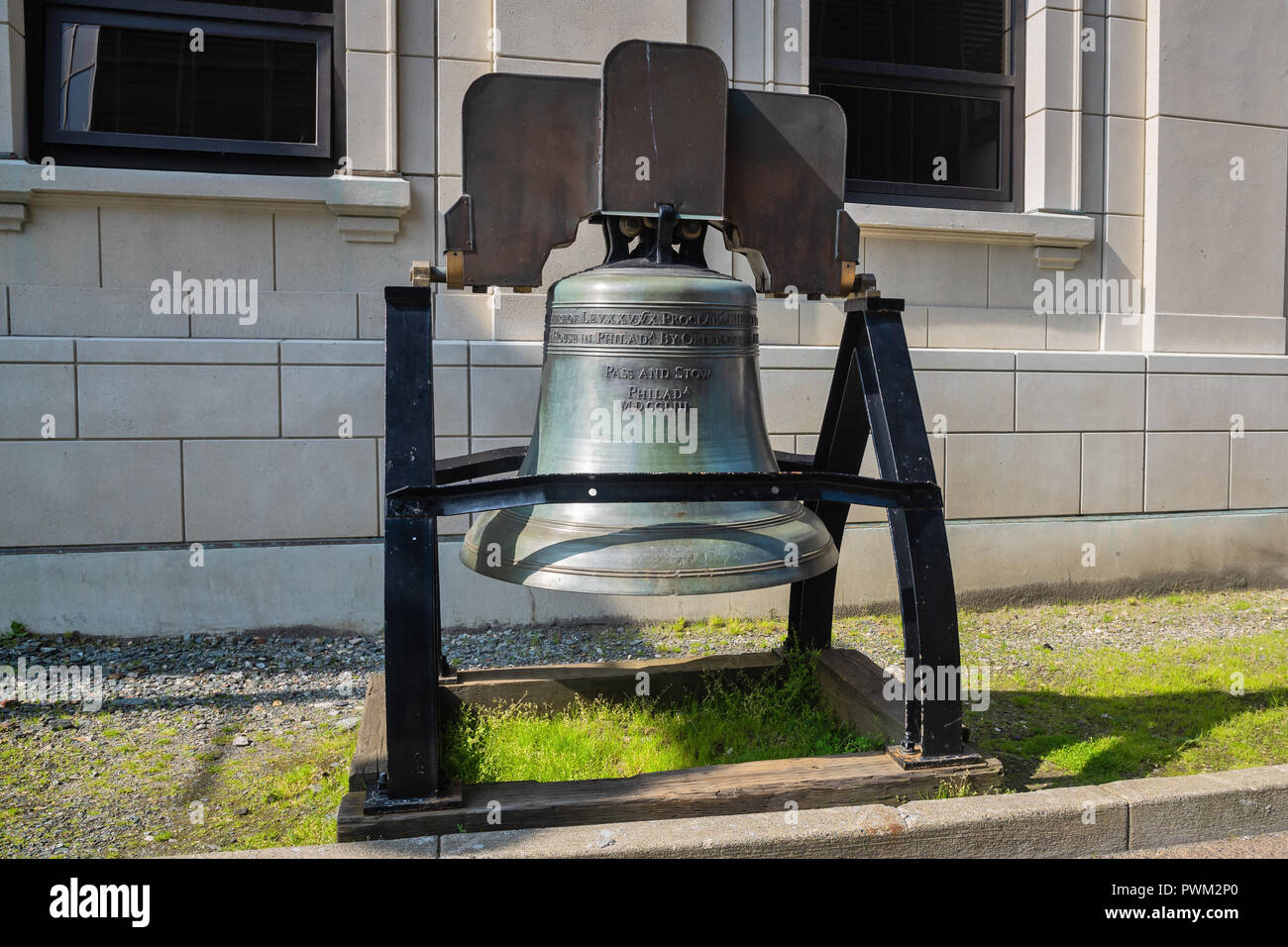 Replica of the Liberty Bell near The Alaska State Capitol , The City and Borough of Juneau,  capital city of Alaska, USA Stock Photo