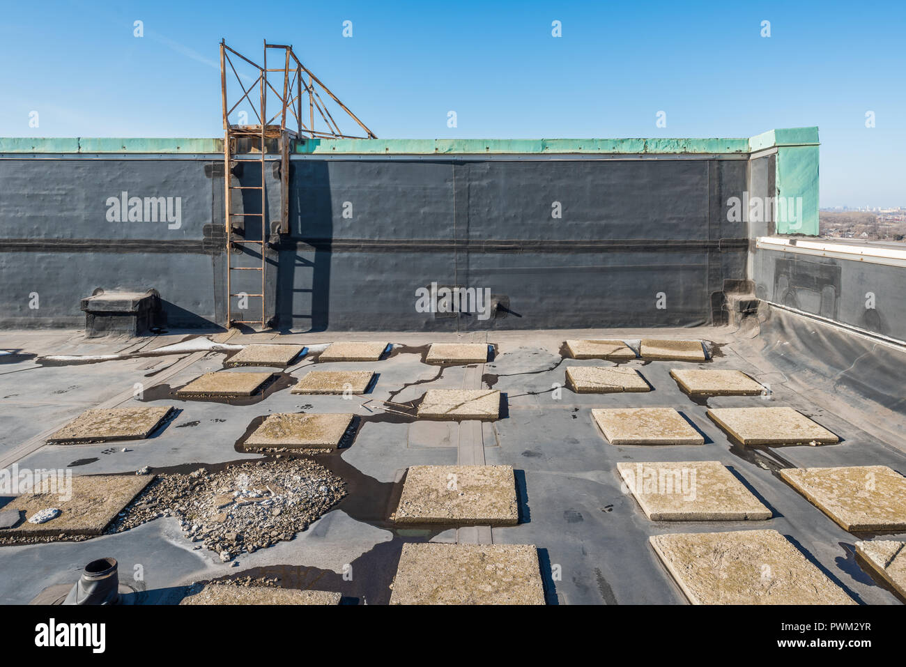 Roof of high rise office building Stock Photo