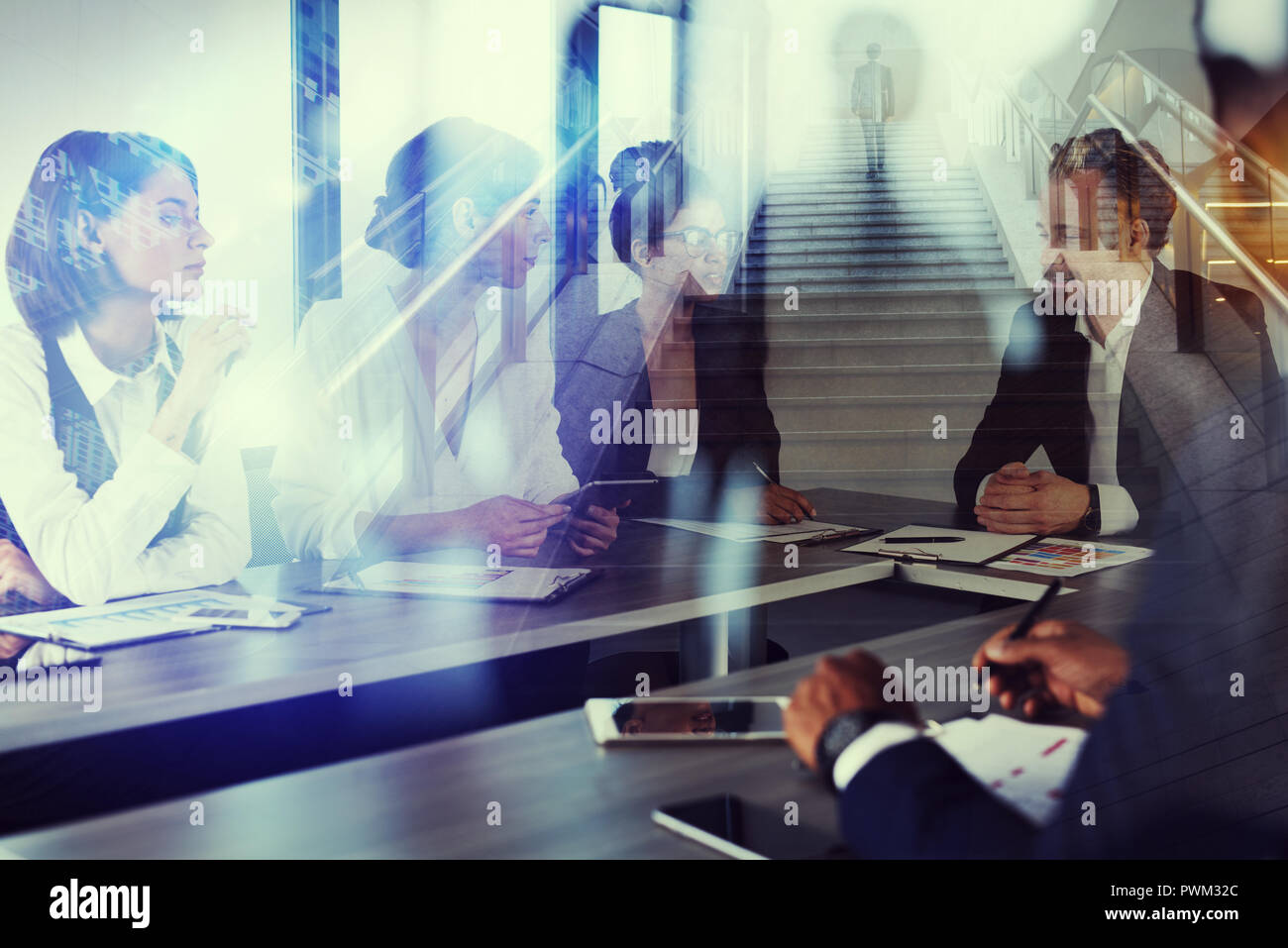 Business man works togheter in office. Concept of teamwork and partnership. double exposure Stock Photo