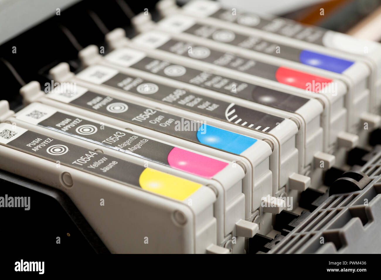 Color inkjet printer head and ink cartridges, close up - USA Stock Photo