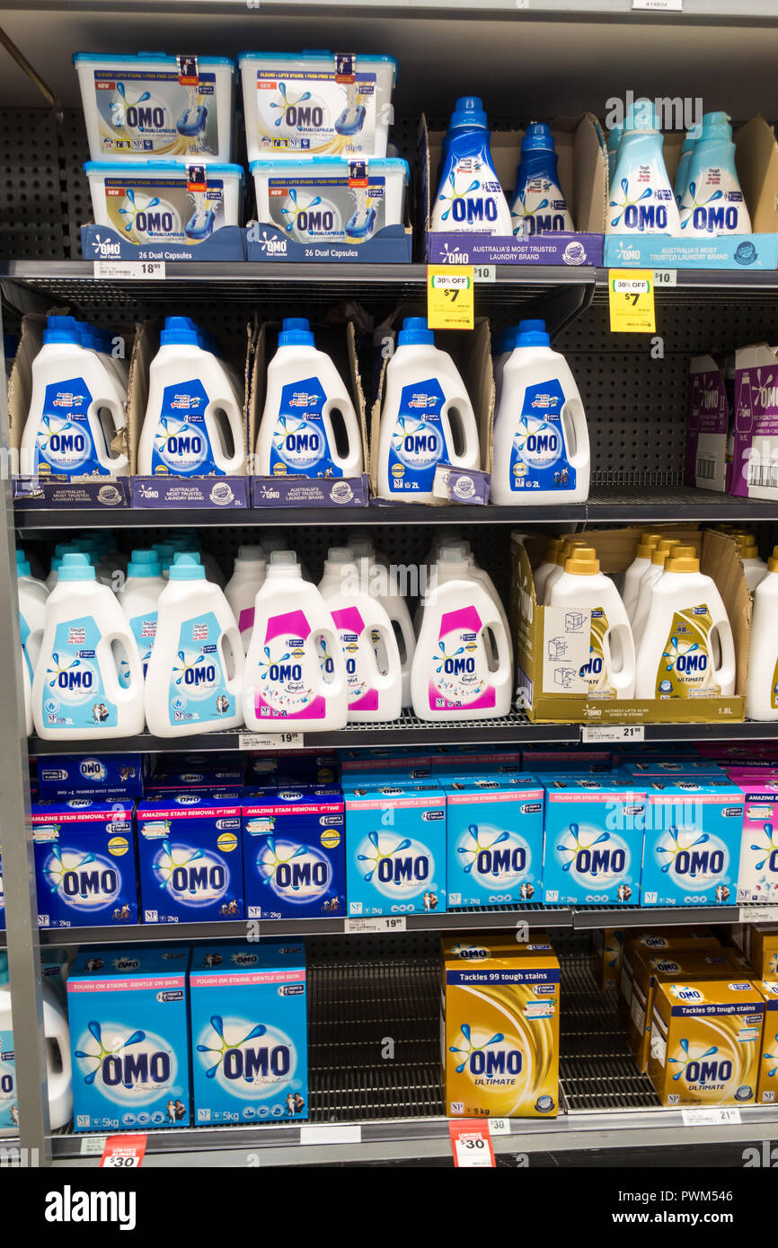 Rows of Omo laundry liquids and powders on Woolworths' shelves,Tamworth Australia. Stock Photo
