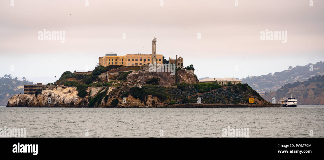 Famed isolated prison Island in the Bay at San Francisco tour boat docked Stock Photo