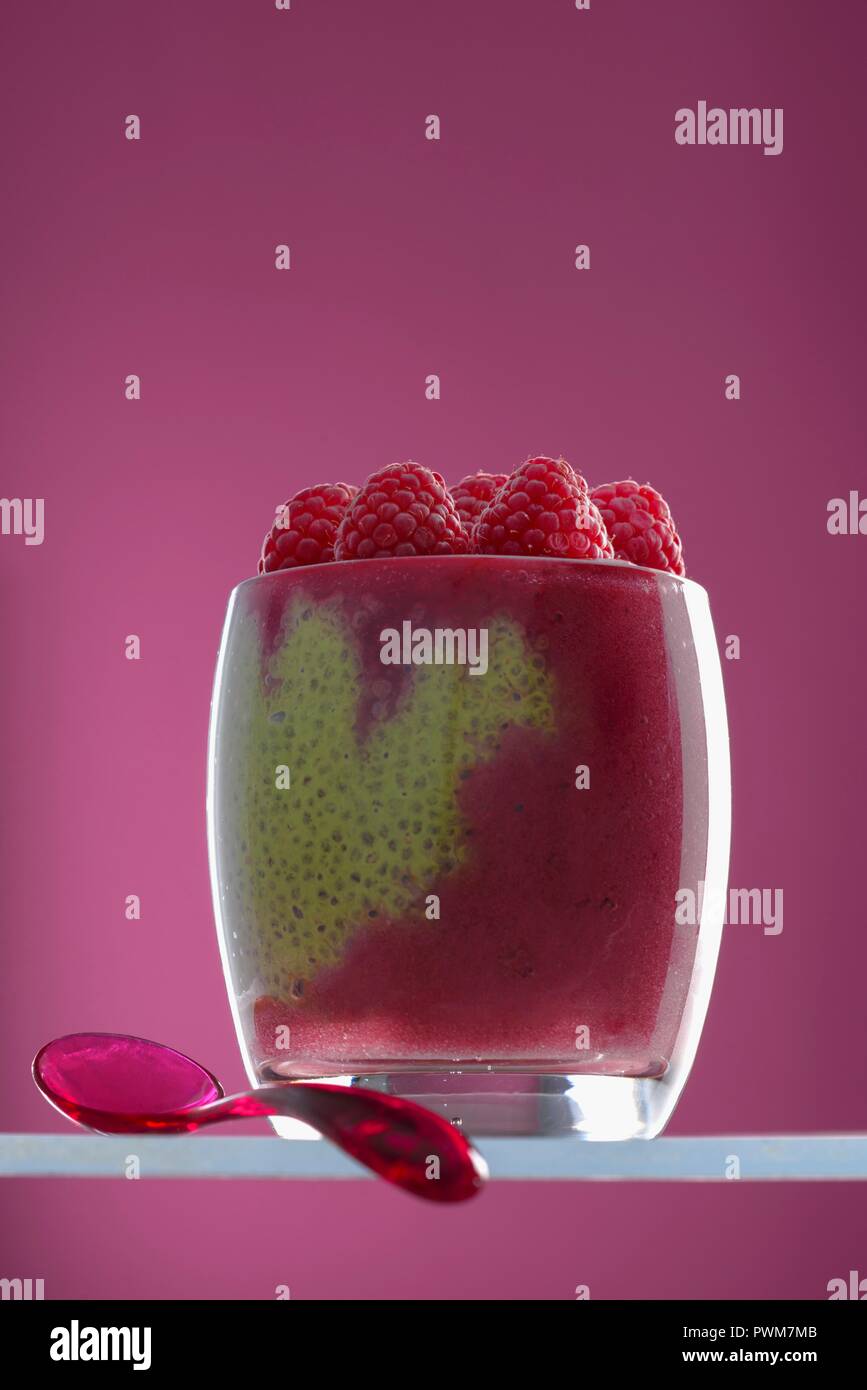 Matcha Raspberry Pudding Matcha chia pudding with raspberry puree in a glass Stock Photo - Alamy