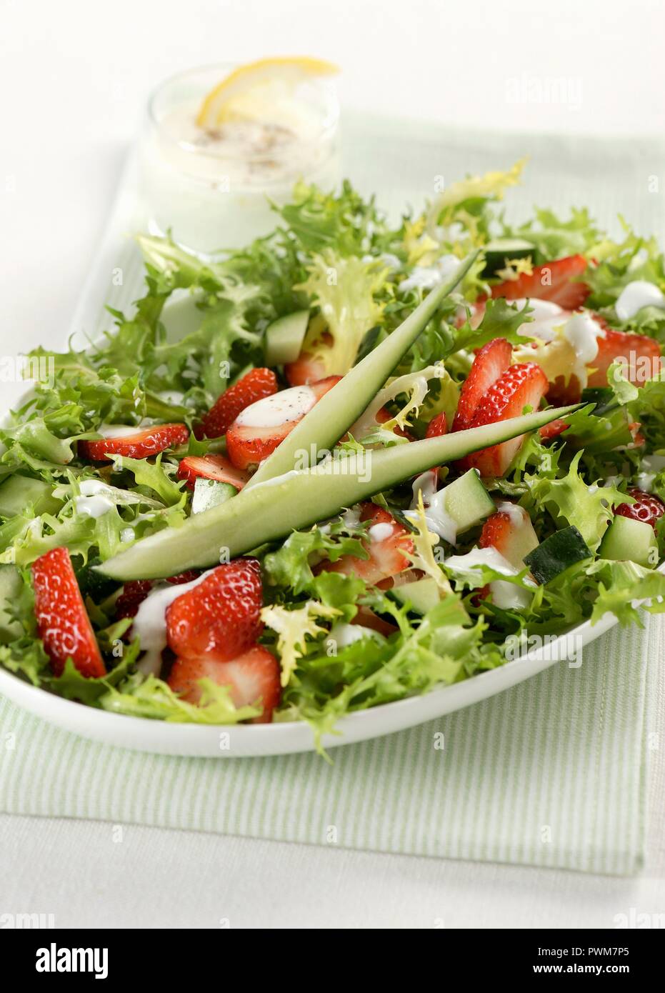 Frisee lettuce with strawberries Stock Photo