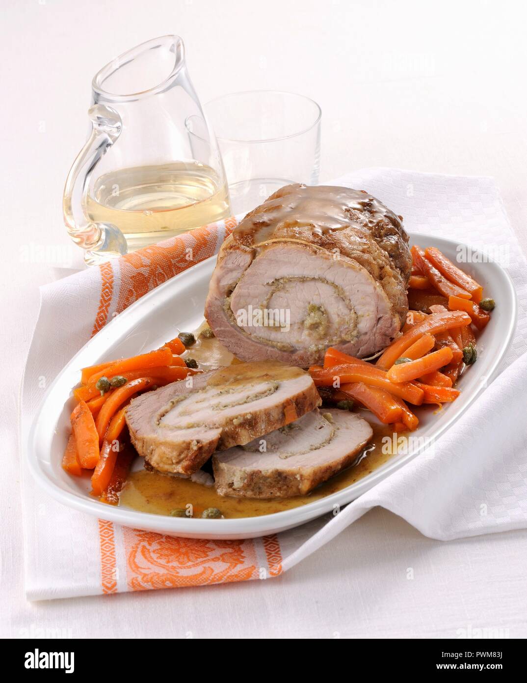 Arrosto di maiale ai capperi (roast pork filled with capers, Italy) Stock Photo