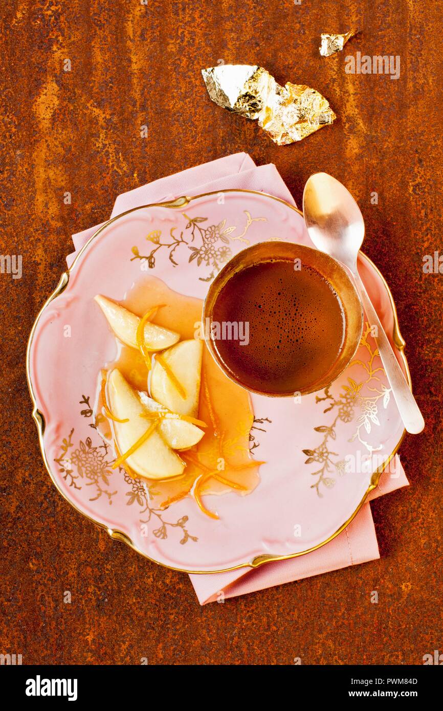 Espresso and chocolate cream with pear in orange liqueur Stock Photo