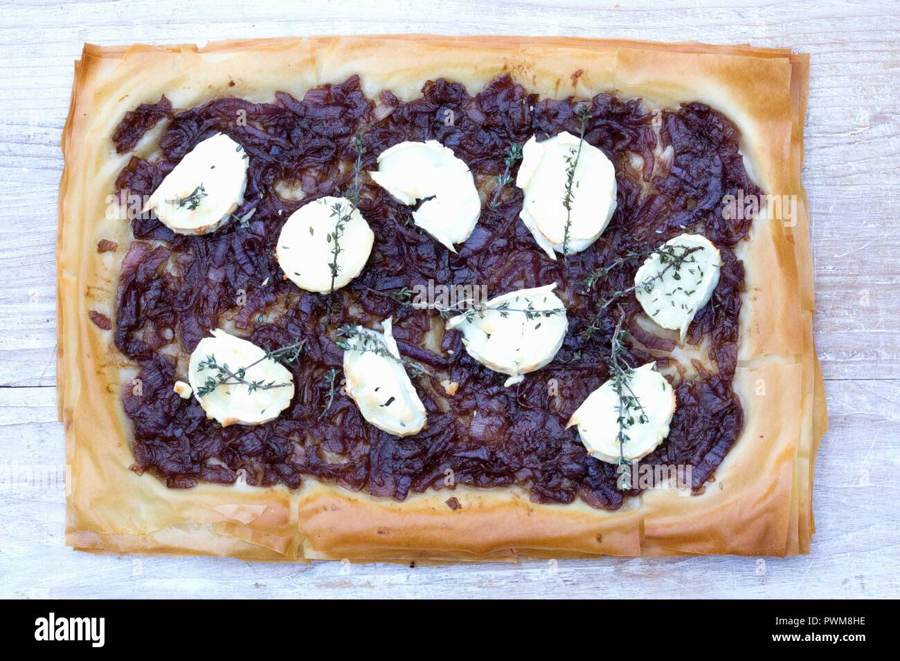 Quiche with Goats Cheese and Caramelised Onion Stock Photo Alamy