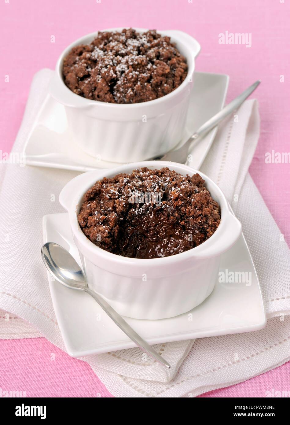 Chocolate flan in ramekins Stock Photo Alamy