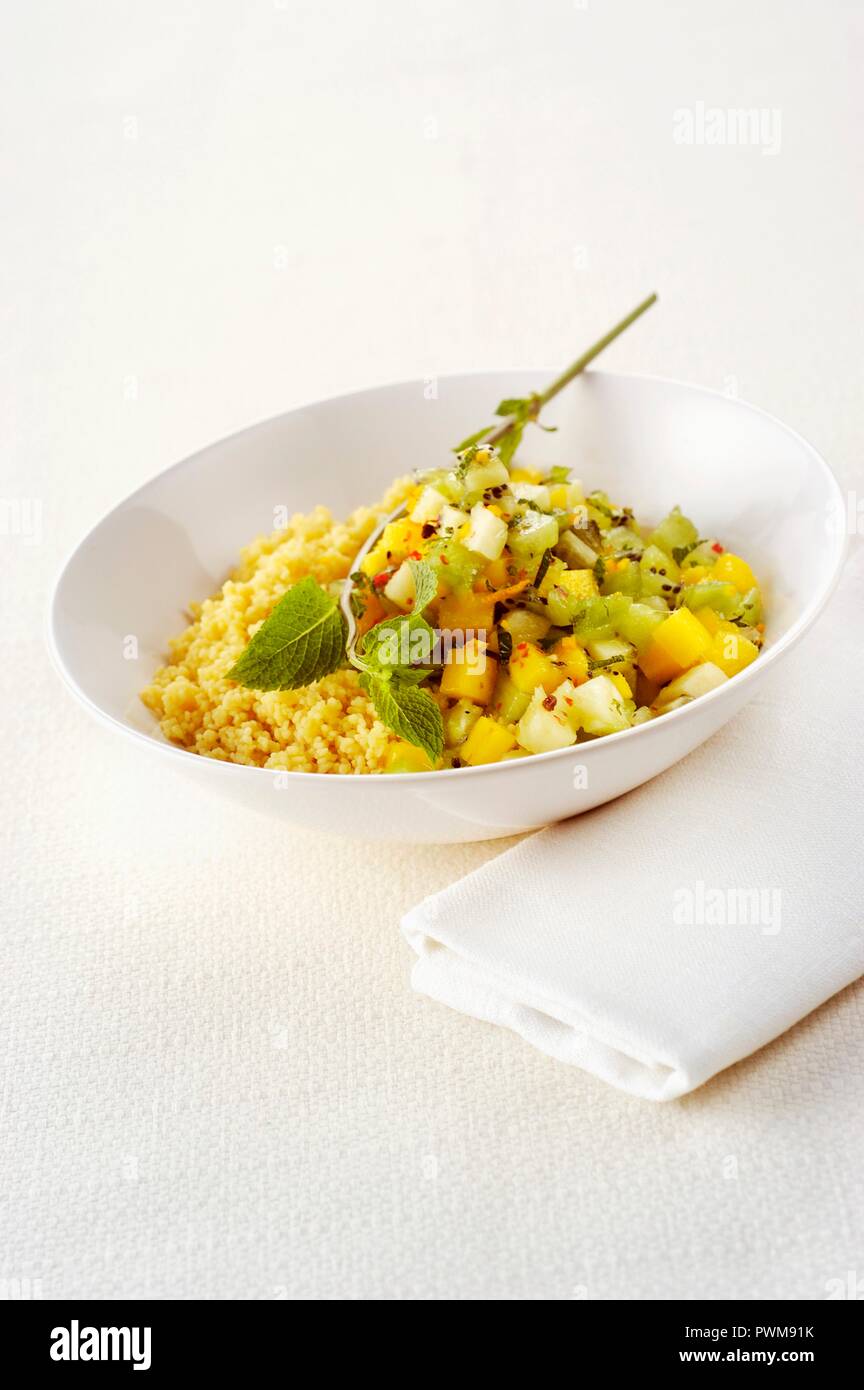Fruit salad with couscous and peppermint Stock Photo Alamy