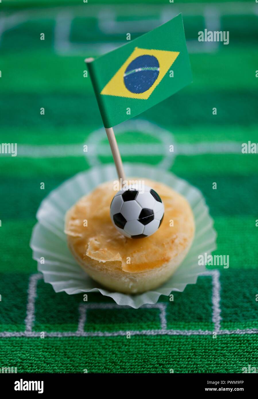 Empadinhas (small pies, Brazil) with a Brazilian flag Stock Photo