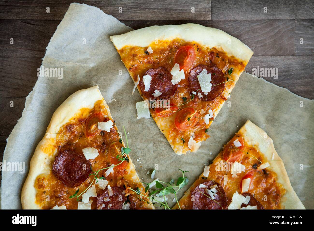 Pepperoni pizza with grated Parmesan Stock Photo Alamy
