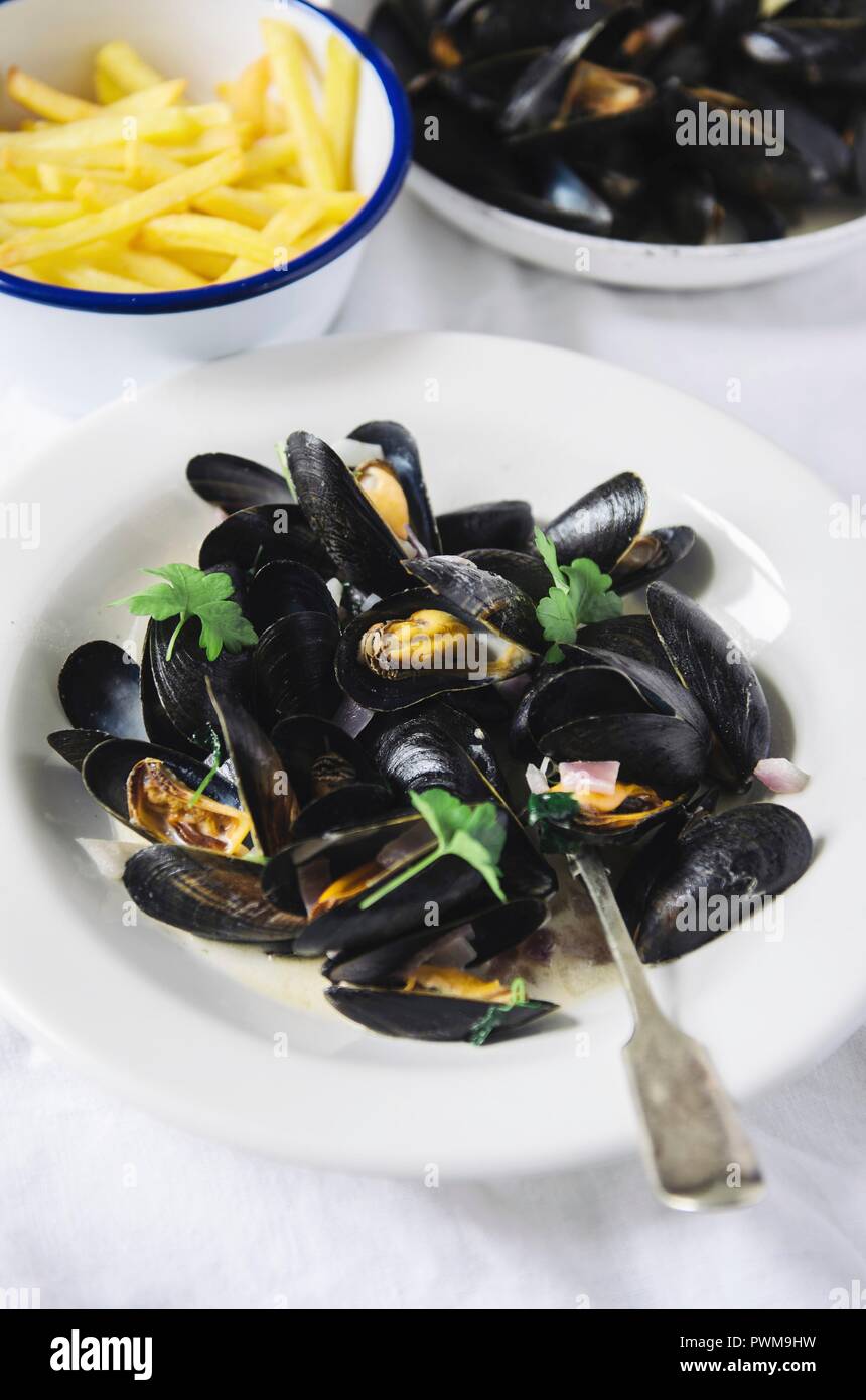 Mussels with french fries Stock Photo Alamy