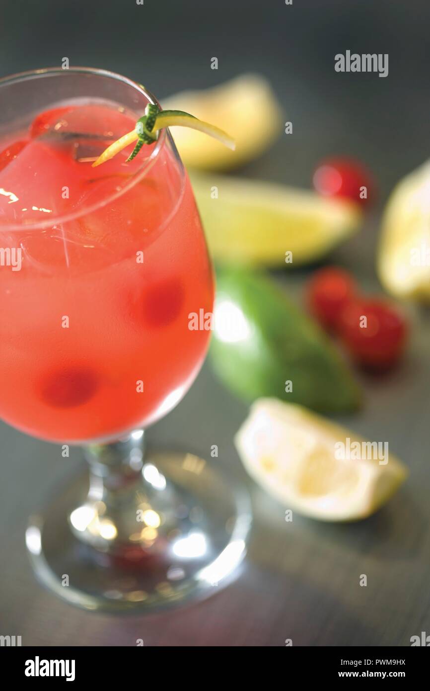 Lemon lime mocktail in pink with cherries Stock Photo Alamy