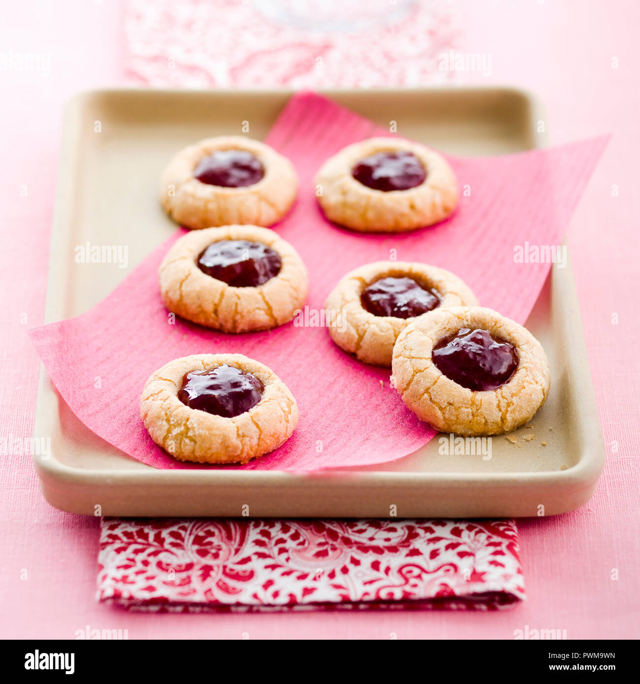 Butter biscuits filled with strawberry jam Stock Photo Alamy