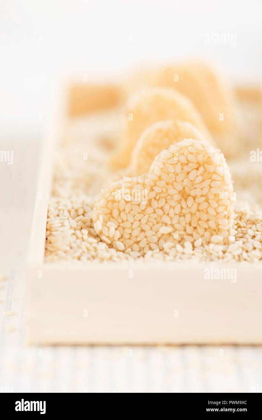 Homemade heartshaped sesame seed sweets Stock Photo Alamy