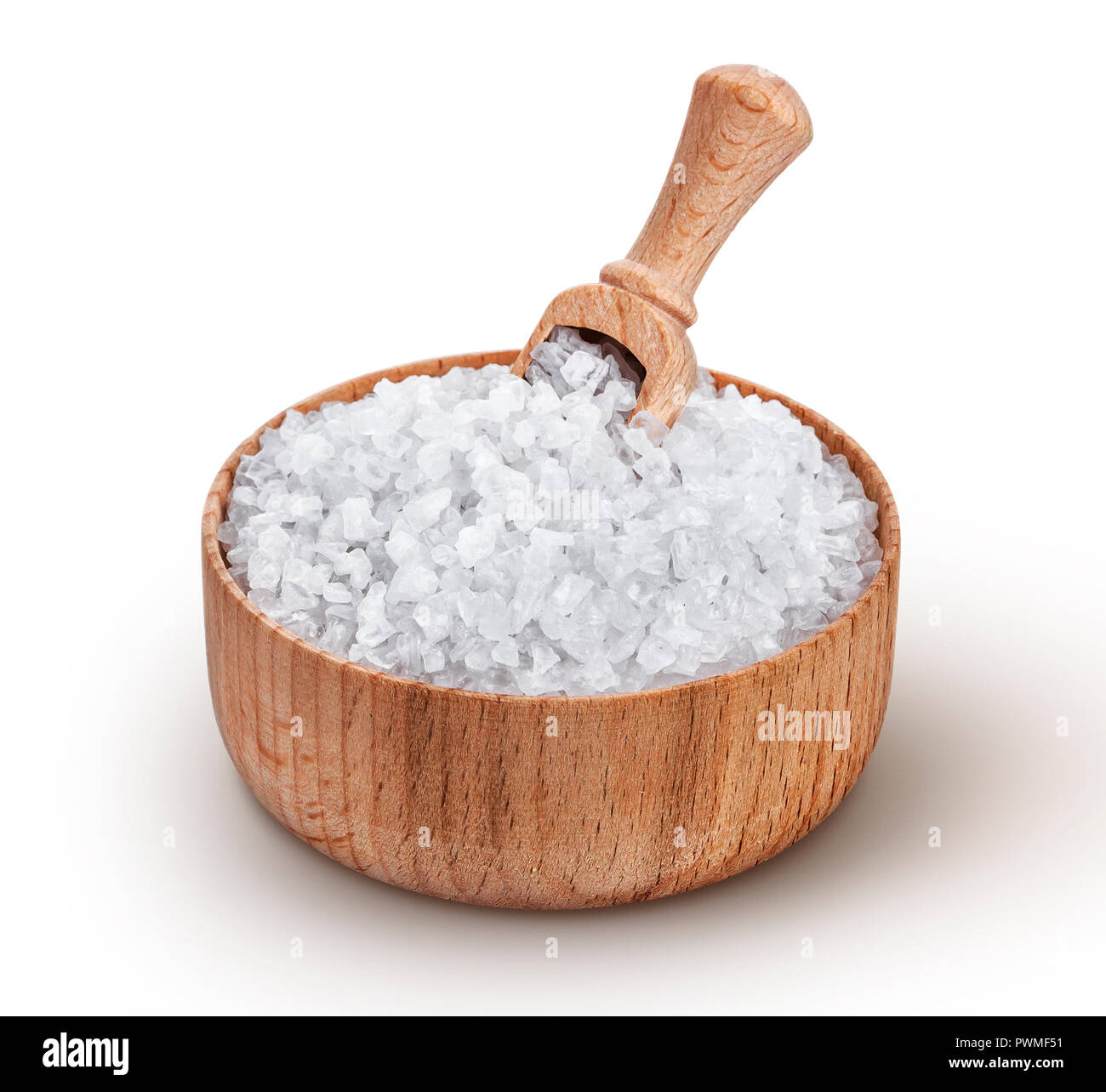 Sea salt in wooden bowl with scoop isolated on white background Stock Photo