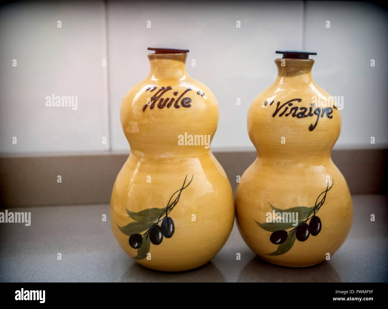 Containers of ceramics of oil and vinegar in a kitchen Stock Photo