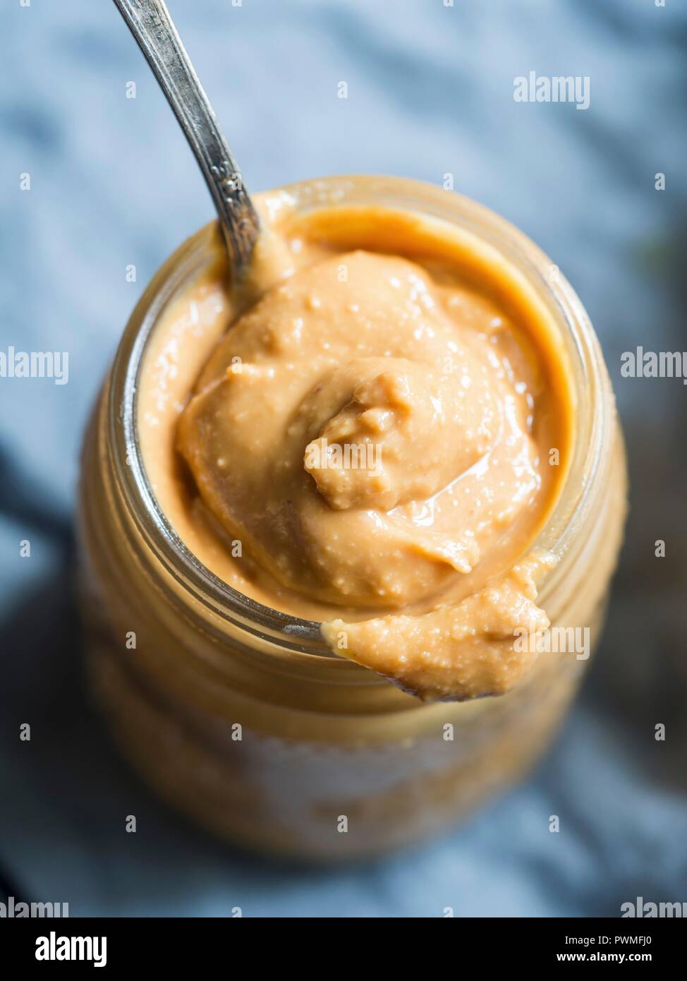 Jar of homemade chunky peanut butter Stock Photo Alamy