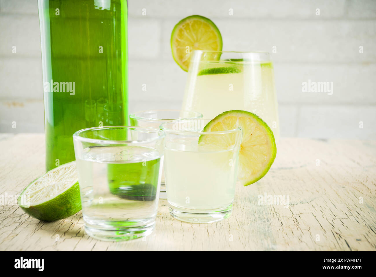 Traditional korean alcohol drink soju with sojulime cocktails on light