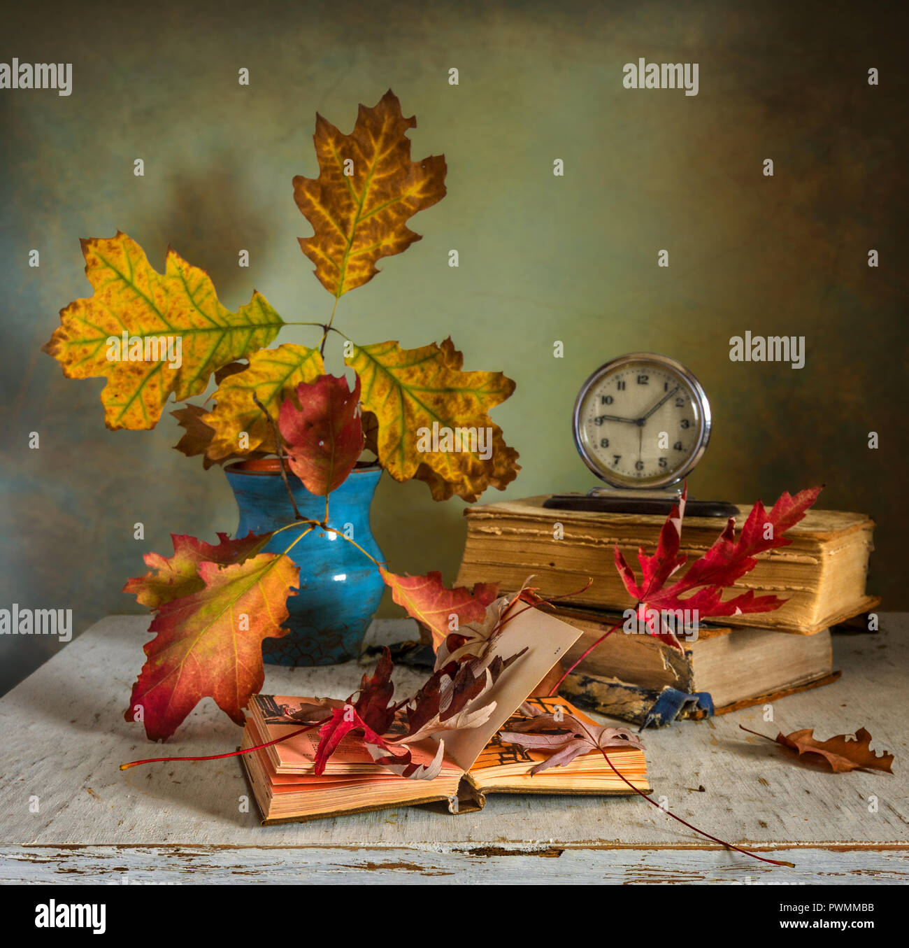 Still life with books and autumn leaves. vintage autumn colors. melancholy. Stock Photo