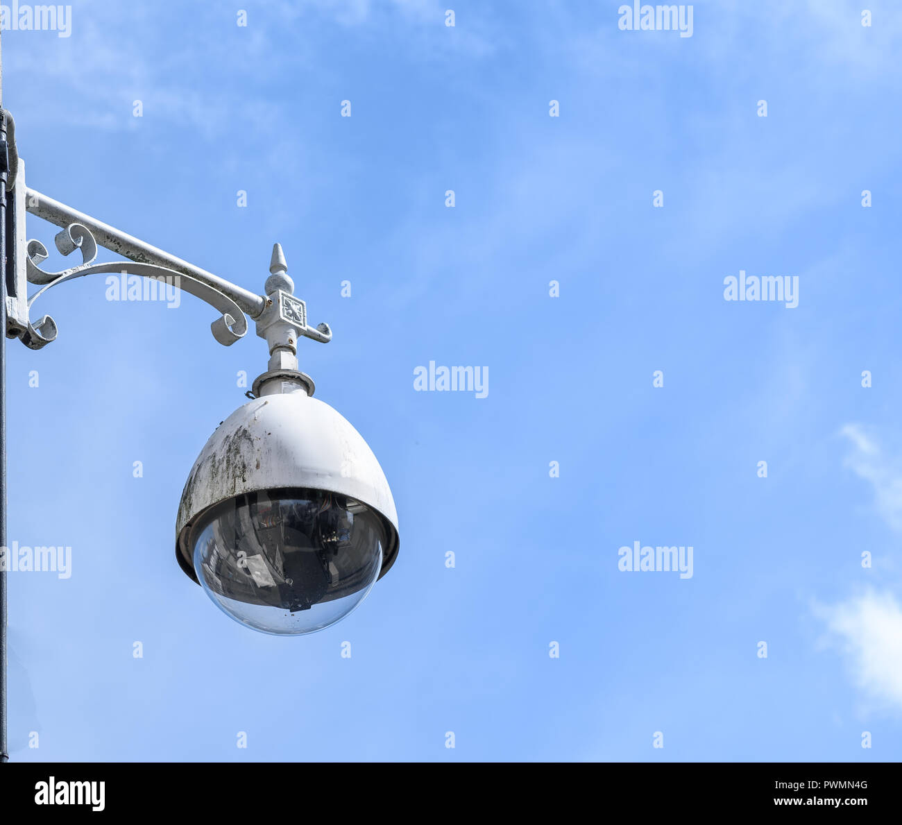 A circuit camera mounted on an ornate bracket. Stock Photo