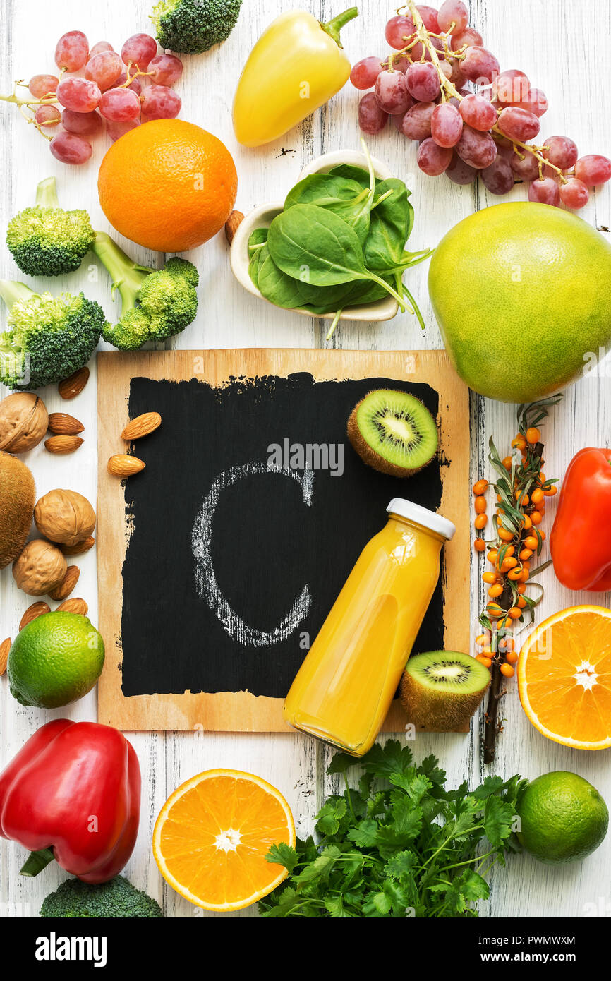 Foods High In Vitamin C Citrus Broccoli Nuts Pepper Grapes Kiwi Sea Buckthorn Spinach Top View Flat Lay Stock Photo Alamy