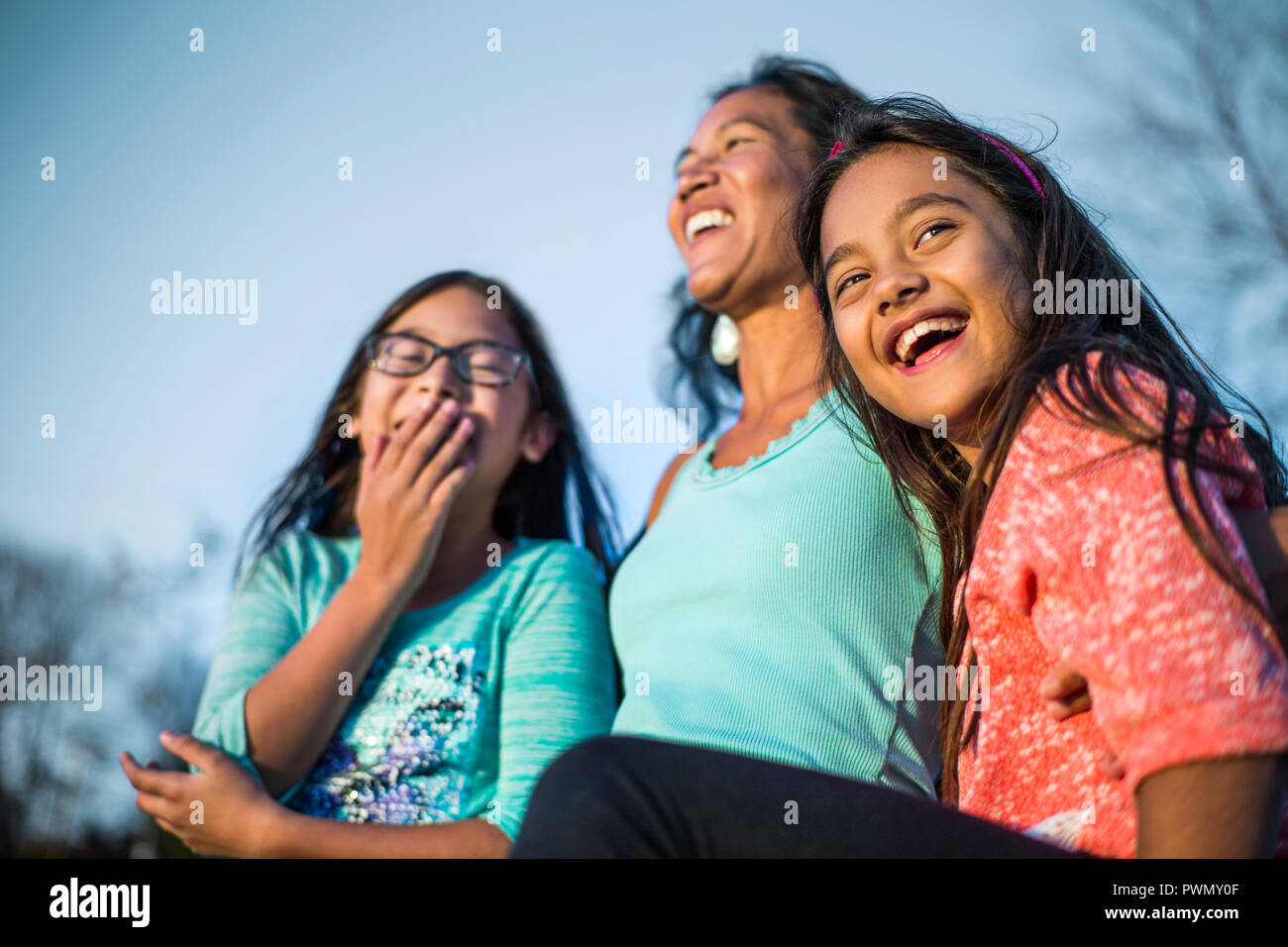 Portrait of mother and daughters. Stock Photo