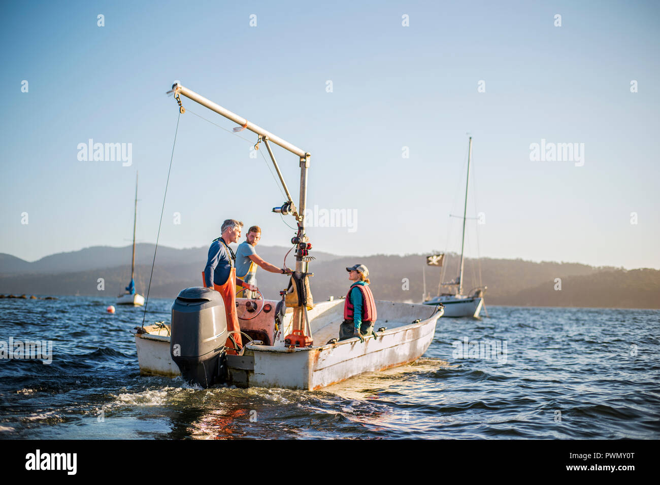 Three boys rigging hi-res stock photography and images - Alamy