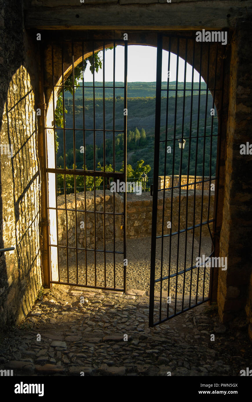 Opened gate in Alquezar Spain Stock Photo
