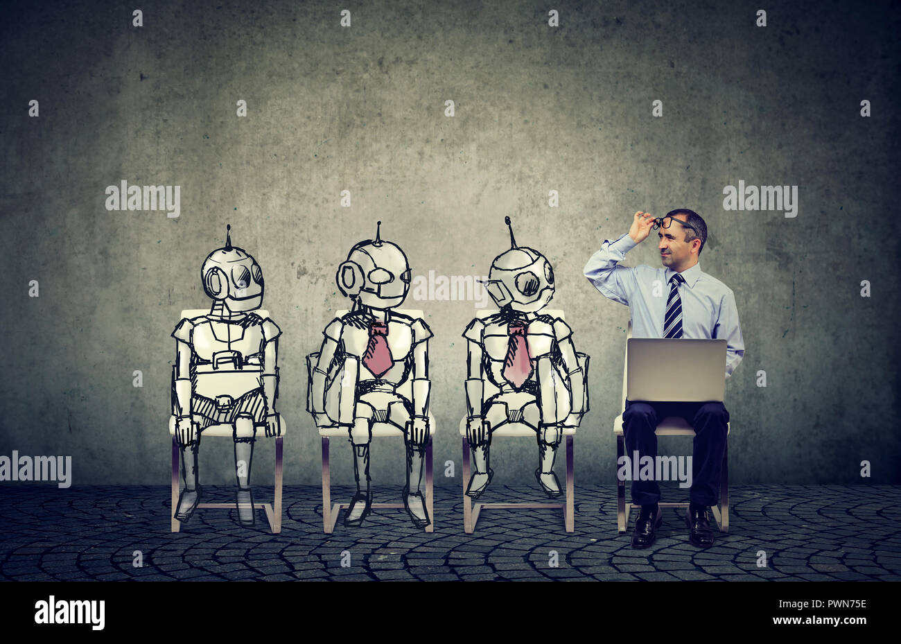 Human vs artificial intelligence concept. Business job applicant man competing with cartoon robots sitting in line for a job interview Stock Photo