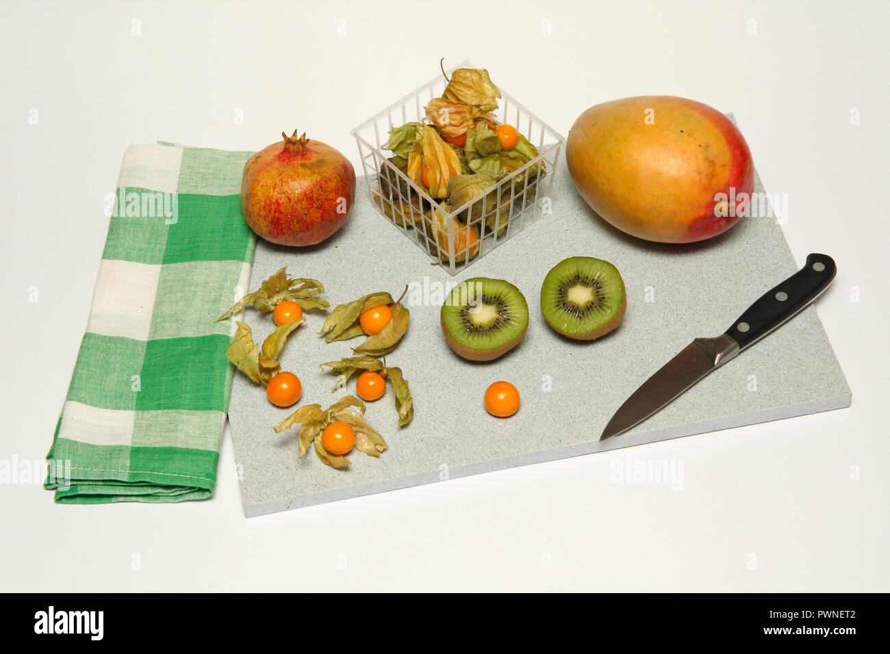 Cutting tropical fruits Stock Photo Alamy