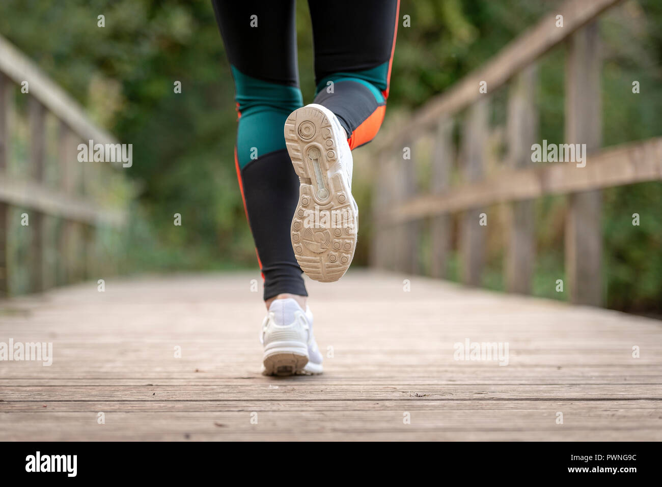 Woman jog low angle feet hi-res stock photography and images - Alamy