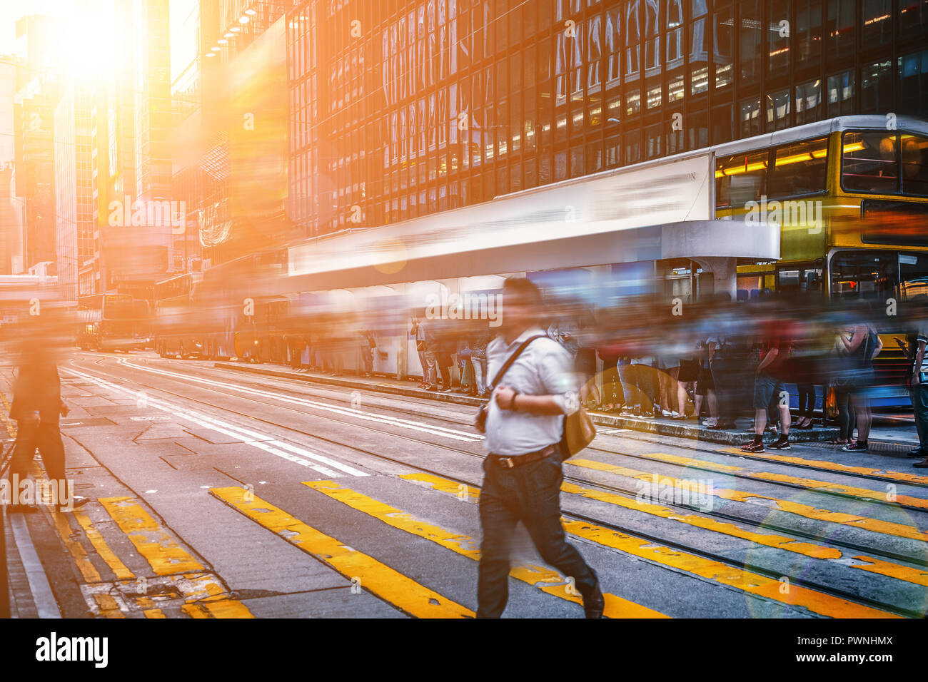 walking people on the busy city street with sunlight effect Stock Photo ...