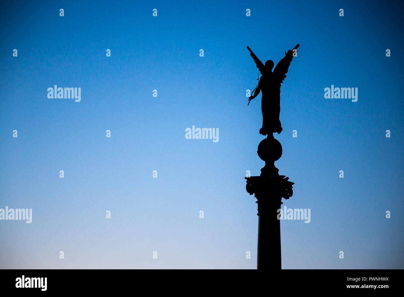 The Angel Column monument in Copenhagen, Denmark at night during the ...