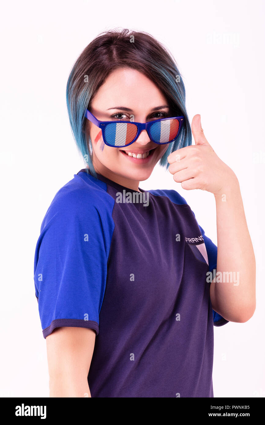 Portrait of a young supporter of the France football team wearing