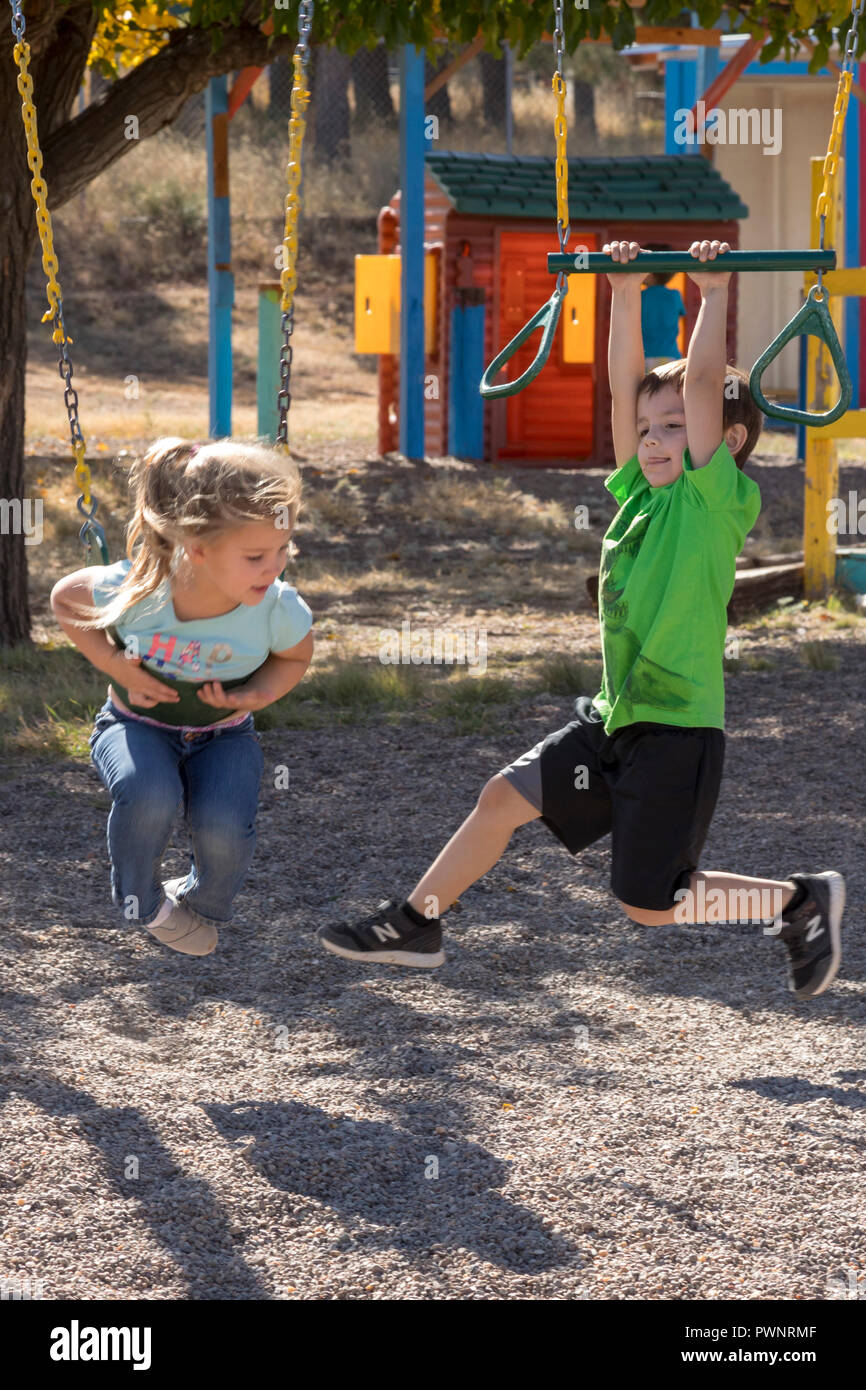 Alpine, Texas - Children on the playground at the Alpine Community Center. The Center is a mission project of United Methodist Women. Stock Photo