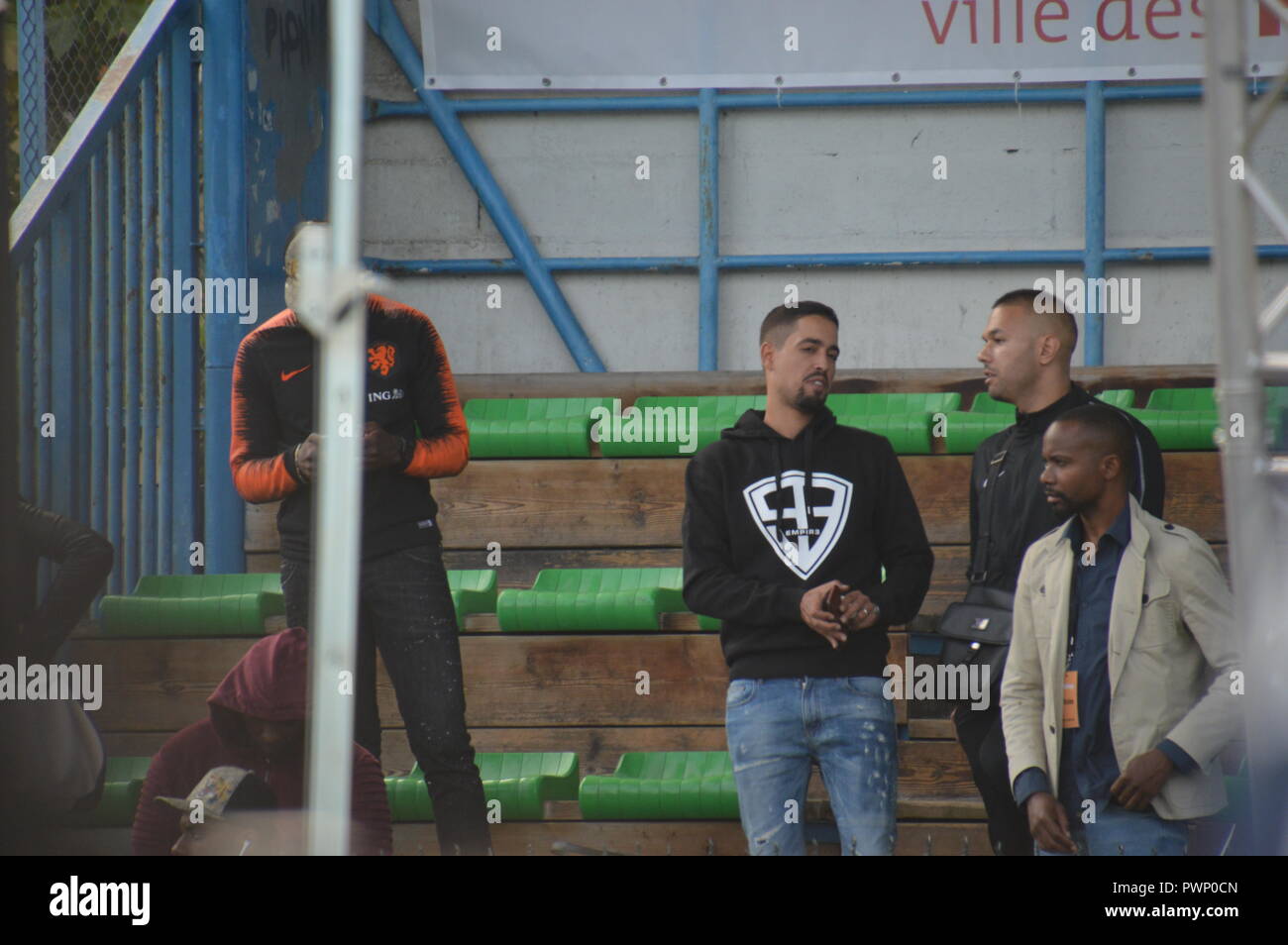 Bondy, France. 17th Oct, 2018. Youssef AKDIM aka LARTISTE (wearing the hoodie).  Kylian Mbappe,  Fifa world cup 2018 soccer champion comes back in his town of Bondy (Paris suburb). Stade Leo Lagrange. Support of his fans and supporters.17 october 2018.14h. Presence  of the french girls band L.E.J, the singer ' LArtiste ', the Mayor of Bondy Sylvine Thomassin.  ALPHACIT NEWIM / Alamy Live News Credit: Alphacit NEWIM/Alamy Live News Stock Photo