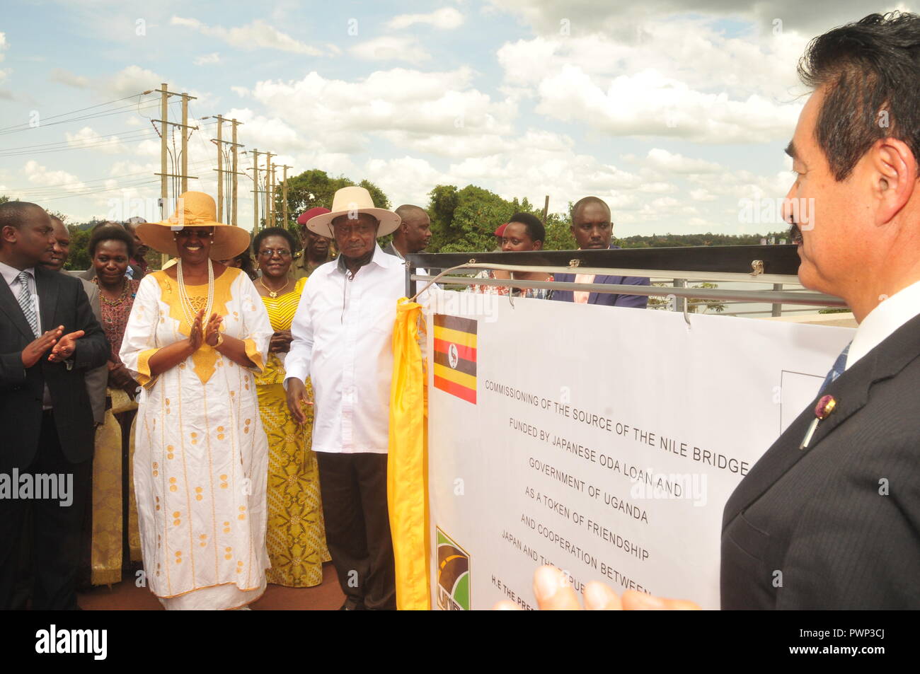 Jinja, Uganda. 17th October, 2018: President of Uganda Yoweri Museveni (middle) and the Vice Minister of Foreign Affairs in Japan Sato Masahisa (right) commissioning the Source of the Nile Bridge in Jinja. Looking on is the First Lady Janet Museveni (2nd left). Credit; Donald Kiirya/Alamy Live News. Stock Photo